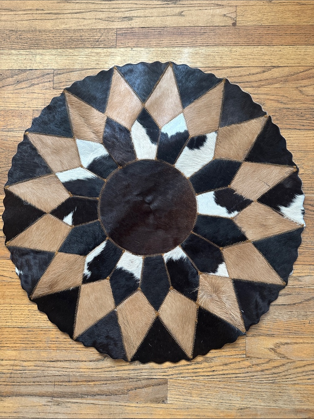 Handcrafted Black and Brown Patchwork Cowhide Rug - Home Accents
